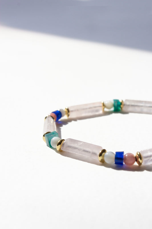 Multicolored beaded bracelet on a white background