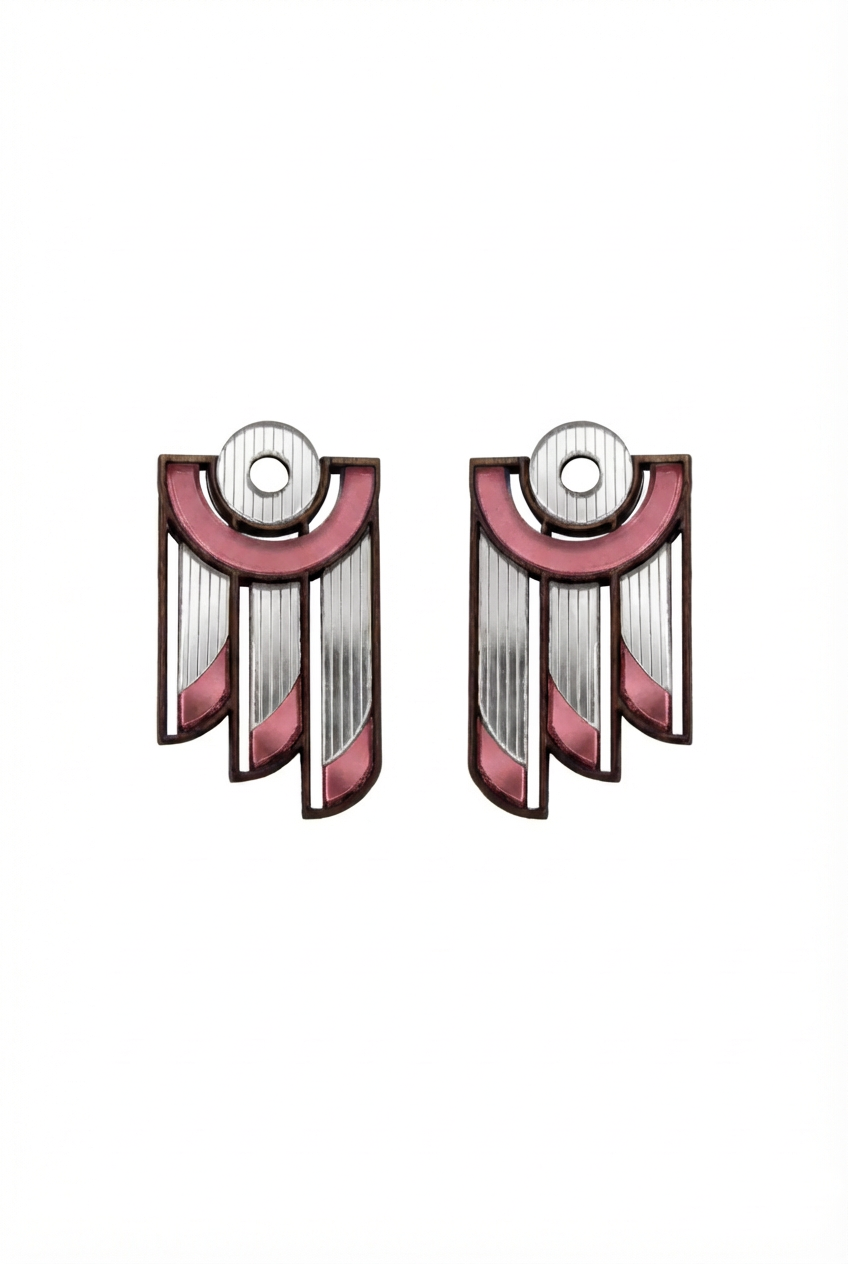 Pair of earrings with pink and silver design on a white background