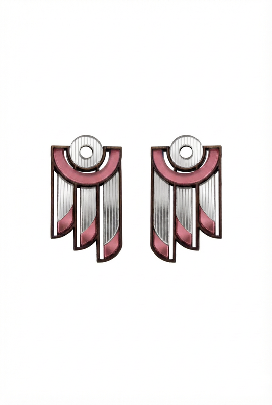 Pair of earrings with pink and silver design on a white background