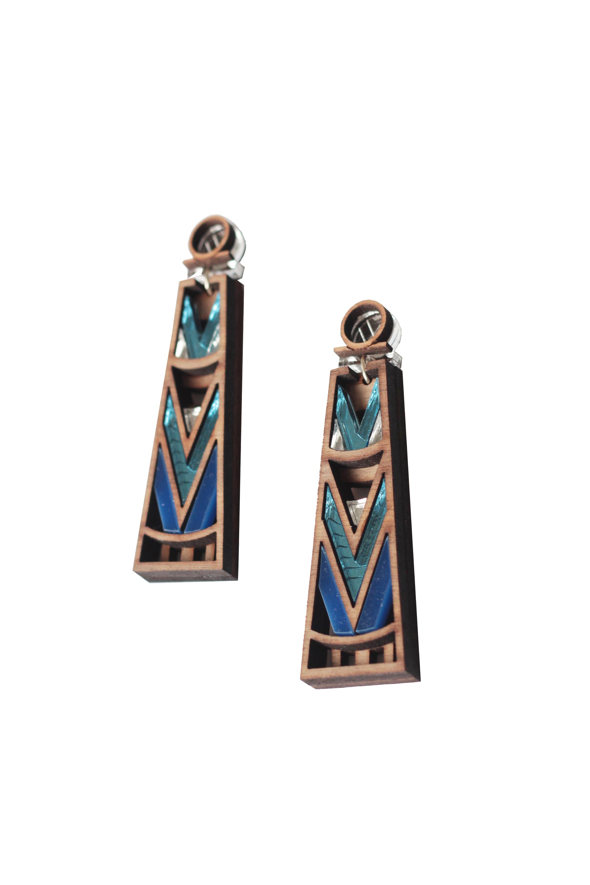 Pair of geometric earrings with blue silver and walnut design on a white background
